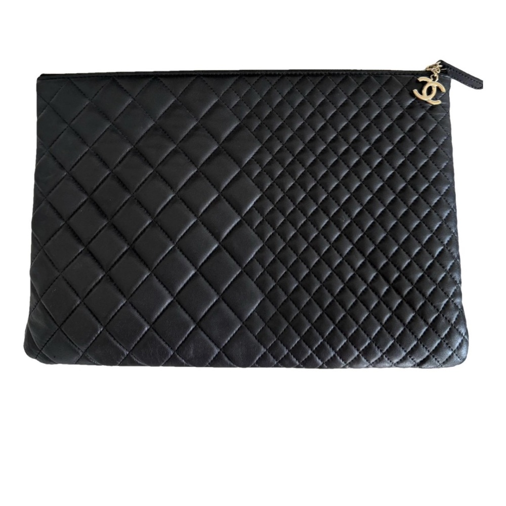 Chanel Classique Black Leather Clutch .